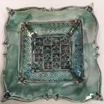 Work is made with terracotta clay, glazed with a variety of earthenware glazes and fired in an electric kiln.